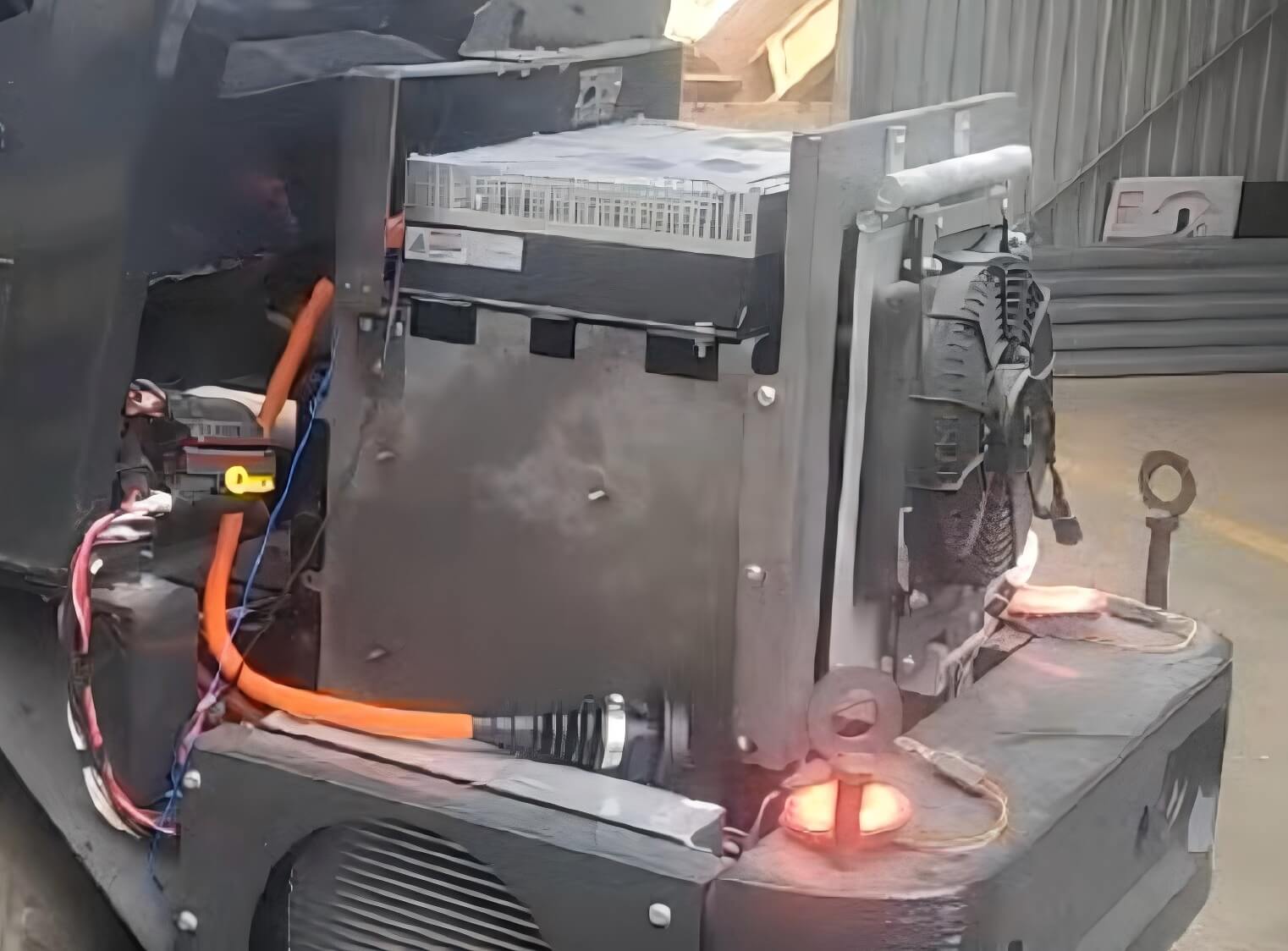 Charger installation with forklift and battery.jpg